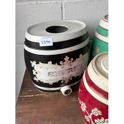 339A - Set of four ceramic alcohol barrels to include Sherry and Gin
