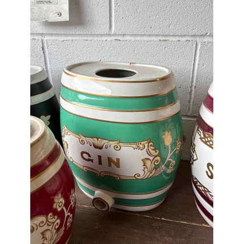 339A - Set of four ceramic alcohol barrels to include Sherry and Gin