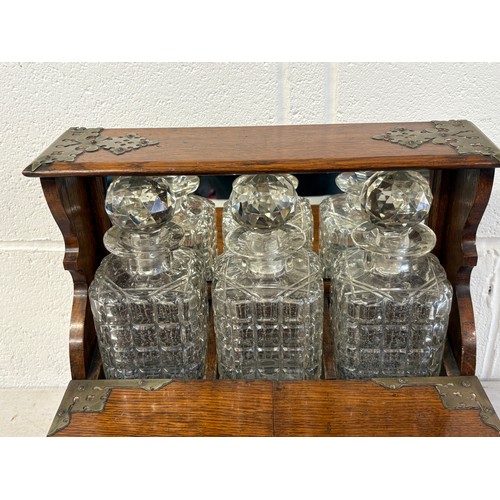 339V - Antique oak tantalus
