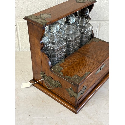 339V - Antique oak tantalus