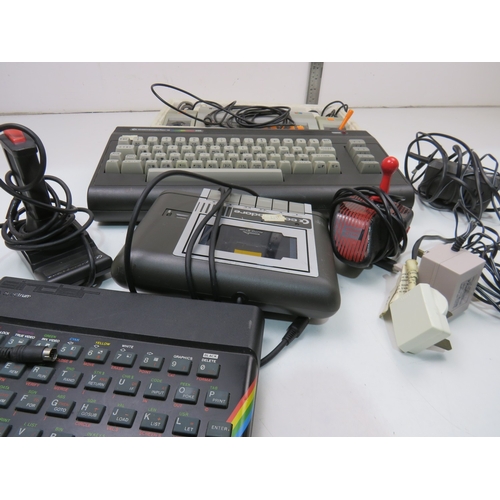 Assortment of vintage games consoles to include Commodore 16, Sinclair ...