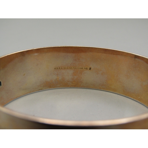 19 - 9ct Gold metal core bangle