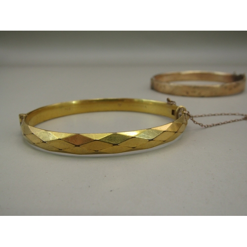 27 - Six gold plated/rolled gold bangles