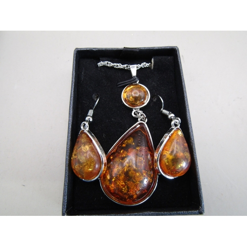 37 - Sterling silver and amber necklace and earring set