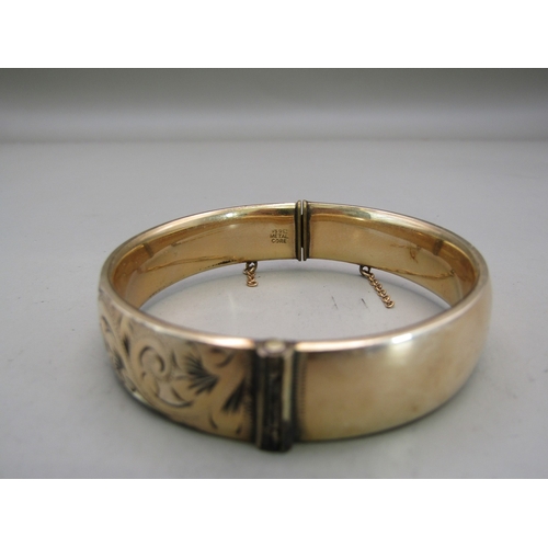 39 - 9ct gold metal core bangle