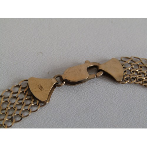 206 - 9ct gold mesh bracelet 7.5