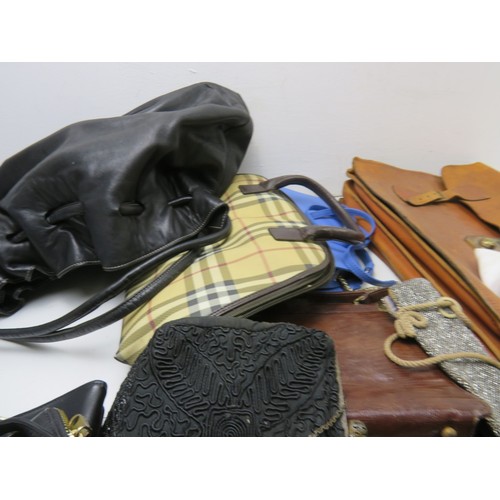 435 - Job lot of assorted handbags.
