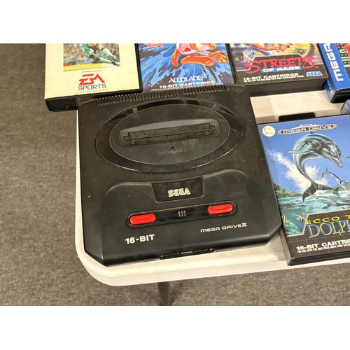 436 - Sega Megadrive 2 with two controllers, cables and an assortment of games