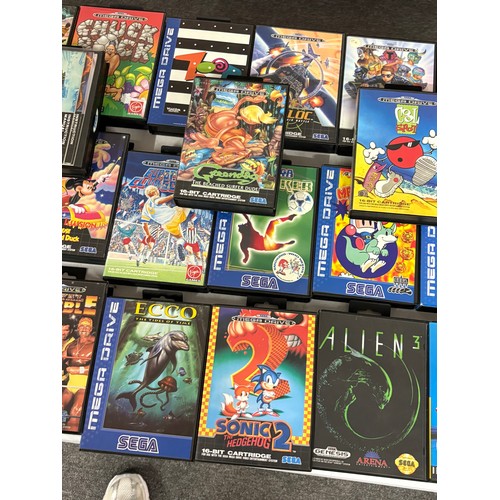 436 - Sega Megadrive 2 with two controllers, cables and an assortment of games