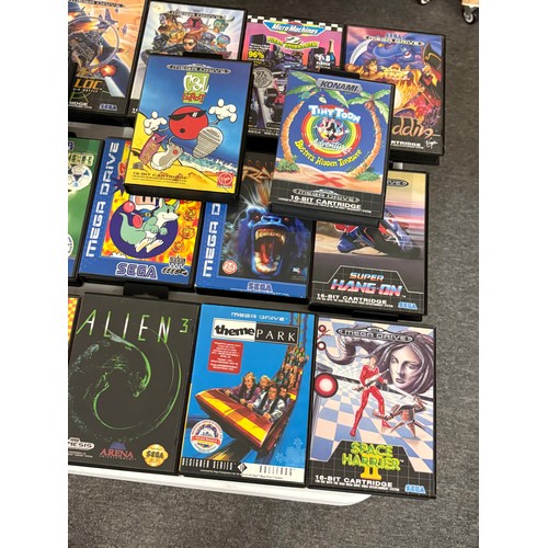 436 - Sega Megadrive 2 with two controllers, cables and an assortment of games