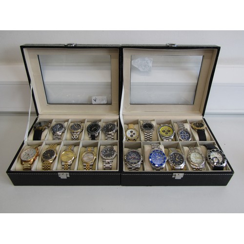 32 - Two boxes of men's quartz watches