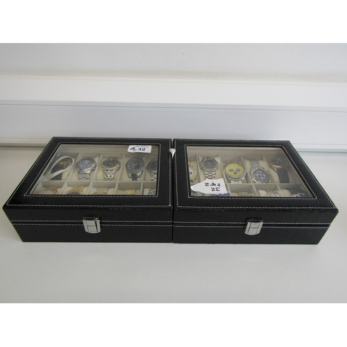 32 - Two boxes of men's quartz watches