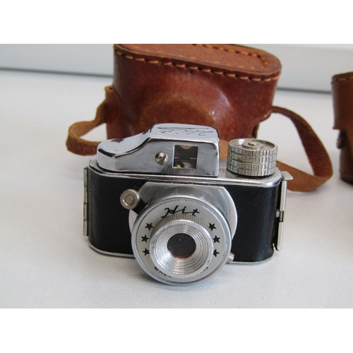 48 - Miniature Minetta camera