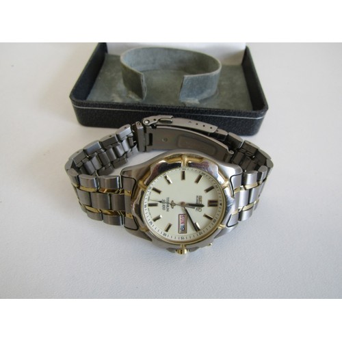 8 - Boxed Seiko SQ 100 Titanium watch