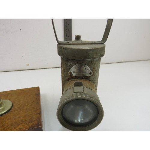 24 - Two Miner's safety lamps, vintage microscope & lenses in case and vintage lemon press