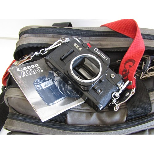 43 - Canon AE-1 camera with lens, accessories and carry case
