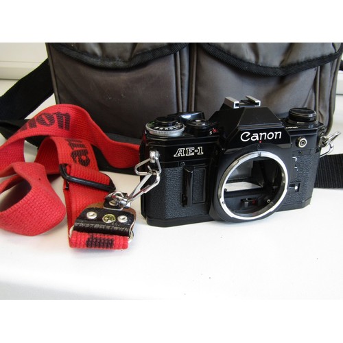 43 - Canon AE-1 camera with lens, accessories and carry case