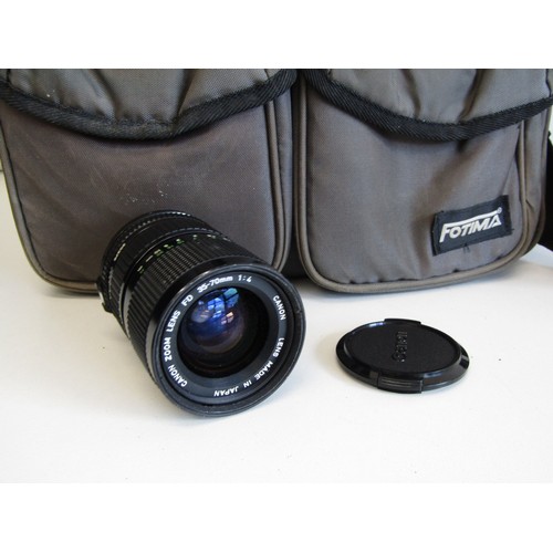43 - Canon AE-1 camera with lens, accessories and carry case