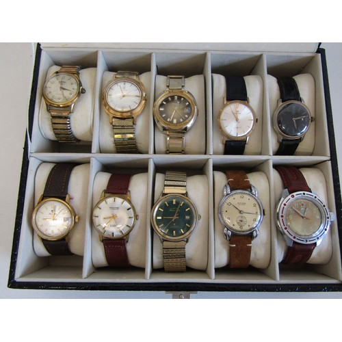 28 - Ten mechanical watches in a display case