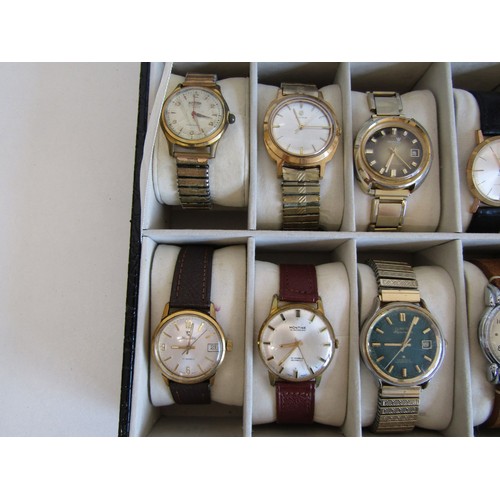 28 - Ten mechanical watches in a display case