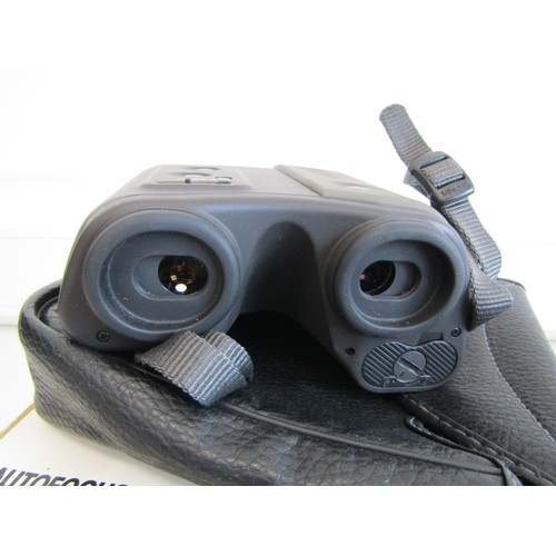 36 - Minolta autofocus binoculars 8x22 with case and booklet
