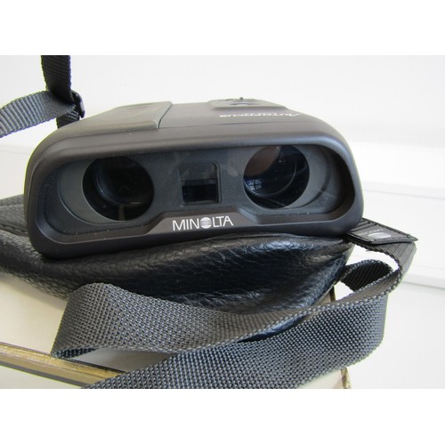 36 - Minolta autofocus binoculars 8x22 with case and booklet