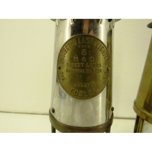 57 - Three full size miner's lamps
