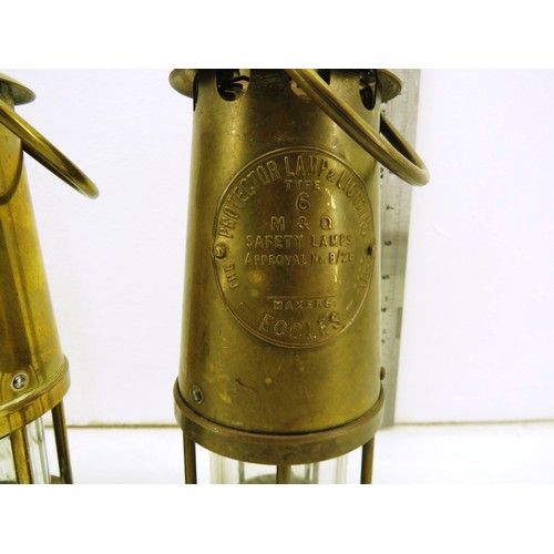 57 - Three full size miner's lamps