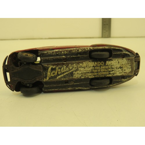 9 - Two vintage tinplate wind up cars