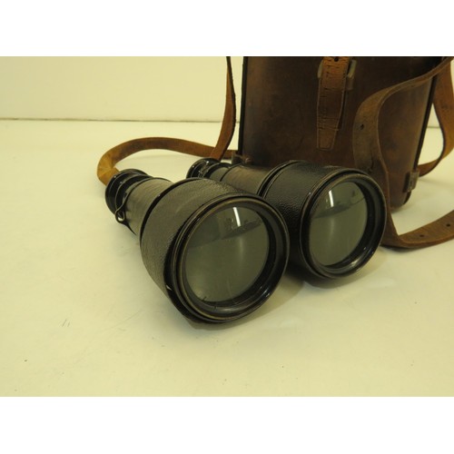 31 - Le Maire binoculars in a brown leather case stamped W.Smart 1917