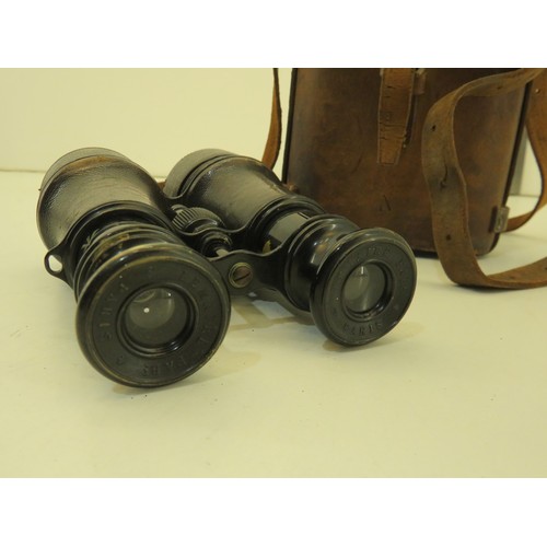 31 - Le Maire binoculars in a brown leather case stamped W.Smart 1917