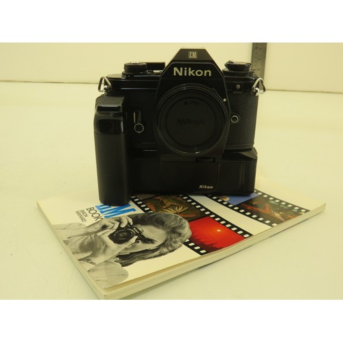 19 - Nikon EM camera with booklet
