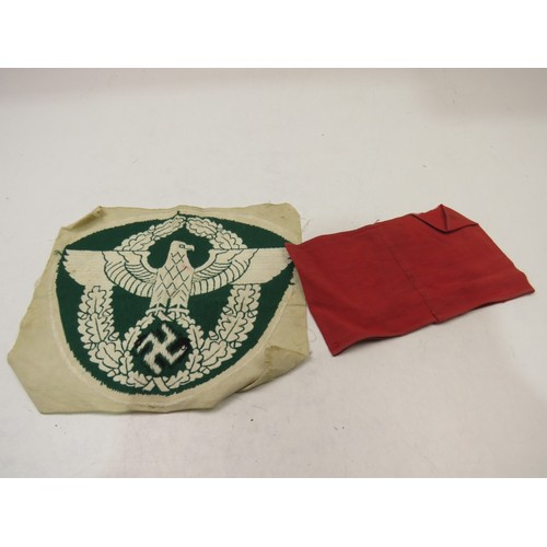 37 - WWII German Police sports vest Breast Eagle patch and a German WWII armband