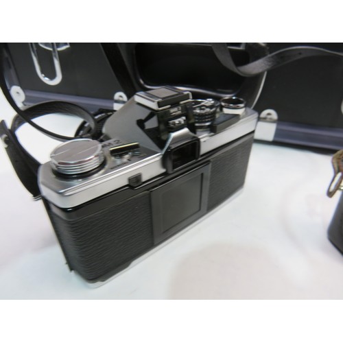 51 - Olympus OM camera with lenses and accessories in black flight case