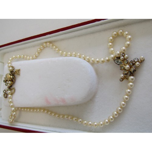 23 - Boxed Majorca pearls necklace and earrings.