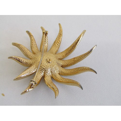 25 - Signed Marcel Boucher brooch and clip on earrings