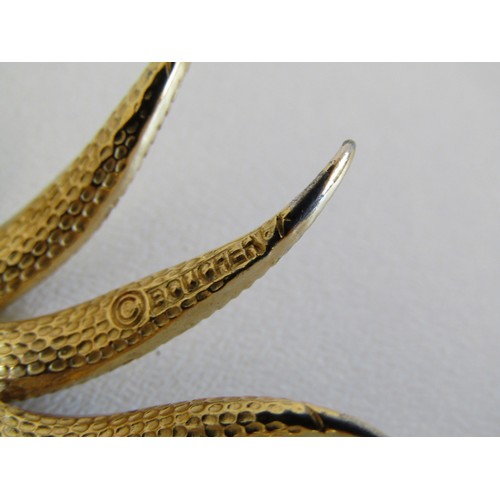 25 - Signed Marcel Boucher brooch and clip on earrings