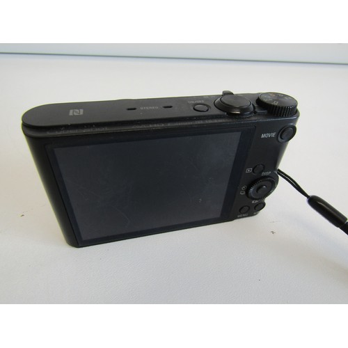 46 - Sony Cybershot digital camera in cases