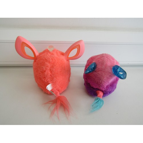 53 - Two Furby interactive toys