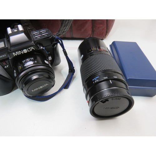 60 - Minolta camera and lens set in carry case