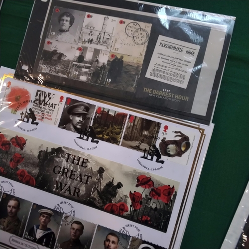 100 - A selection of thirty first class stamps and two other collections featuring World War I.