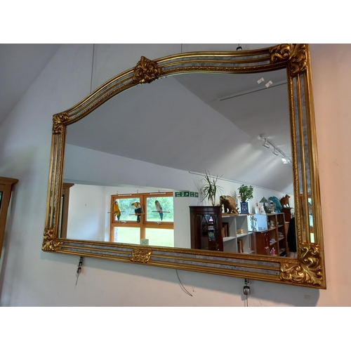 243 - Large mirror with decorative surrounded frame 130x88cm approx.