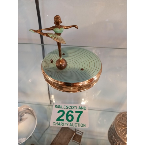 267 - Clockwork enamelled ballet dancer. Probably sat on top of a jar. Working.