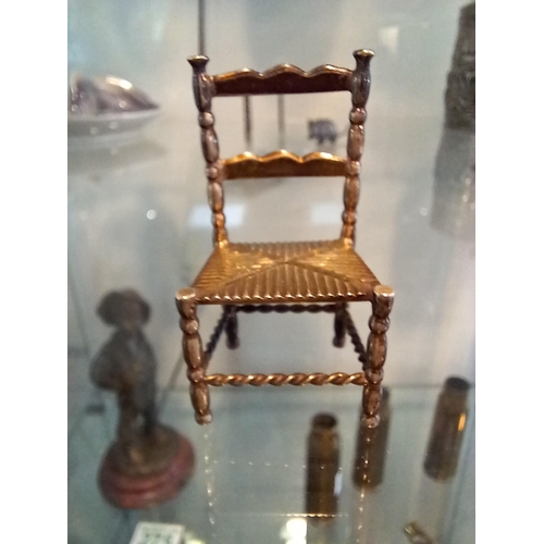 272 - Miniature white metal table, chair and rat.