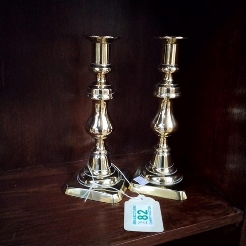 82 - Pair of brass vintage candle sticks