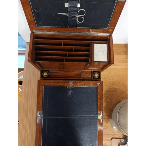 67 - Victorian Oak Travelling Writing box with Slope, brass handles, convex top ink wells, drawers etc.