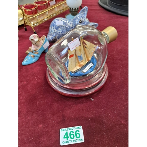 466 - Small bedside oil lamp, ship in bottle, Beatrix Potter 1959 old woman who lived in a shoe etc.