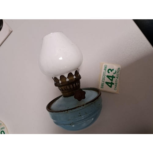 443 - small Bedside oil lamp with shade measuring only 12cm high approx