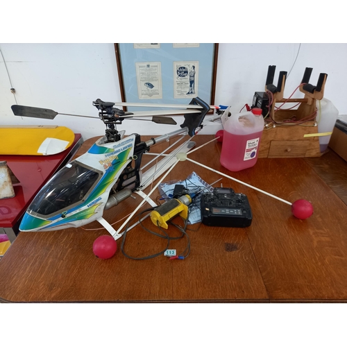 113 - Fun fly Hirobo helicopter with remote control landing bay fuel etc.