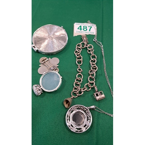 487 - selection of jewellery and a cased mirror